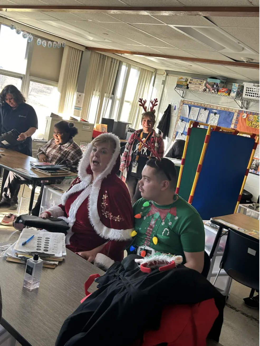 easterseals leadership team spreading holiday cheer and custom lunch bags to students across the city