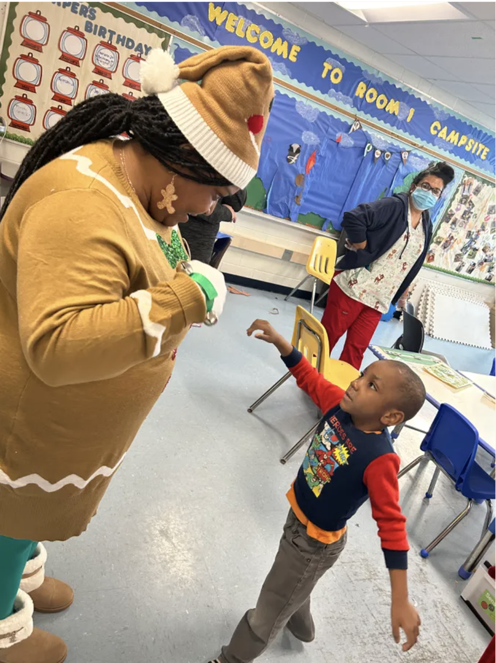easterseals leadership team spreading holiday cheer and custom lunch bags to students across the city
