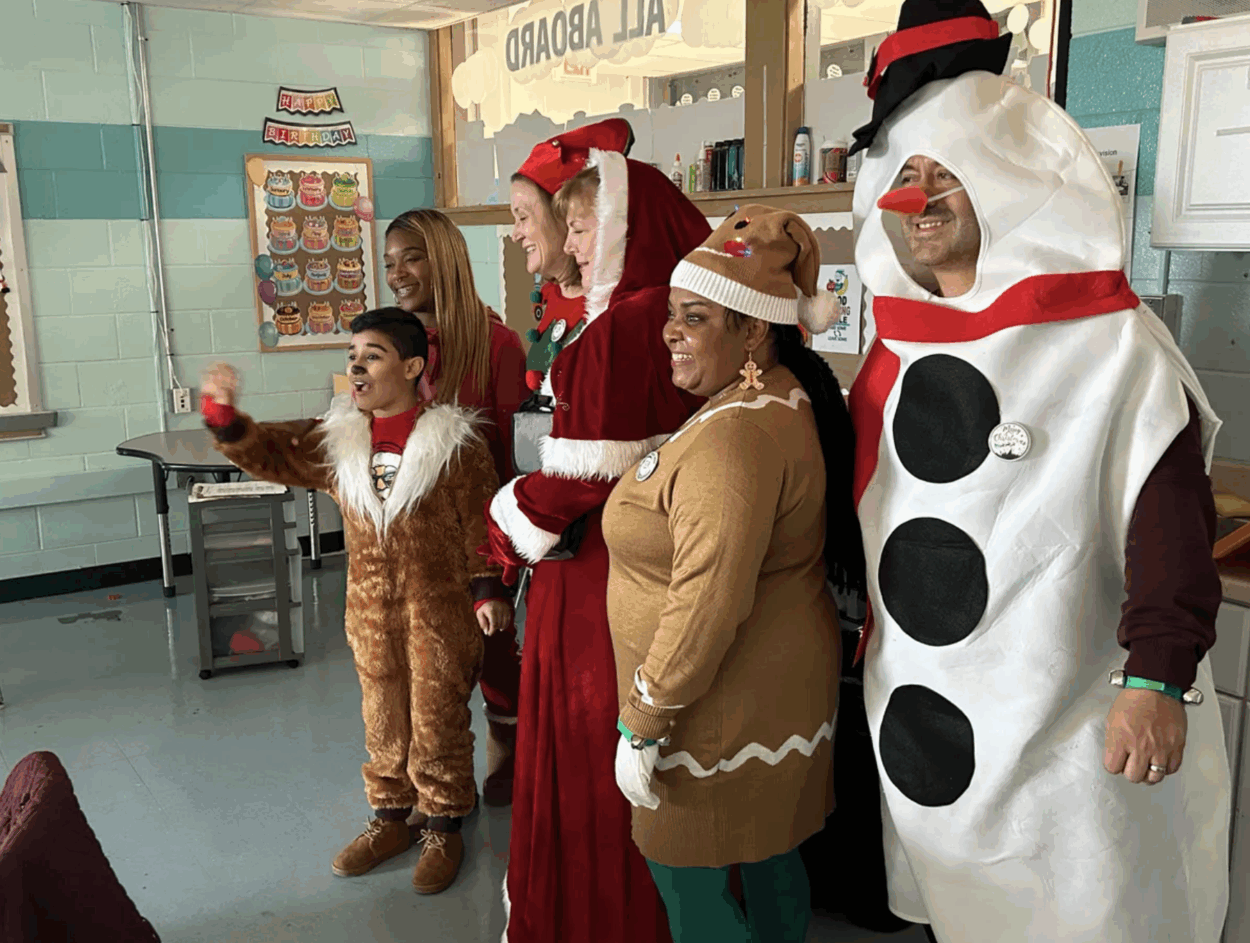 easterseals leadership team spreading holiday cheer and custom lunch bags to students across the city