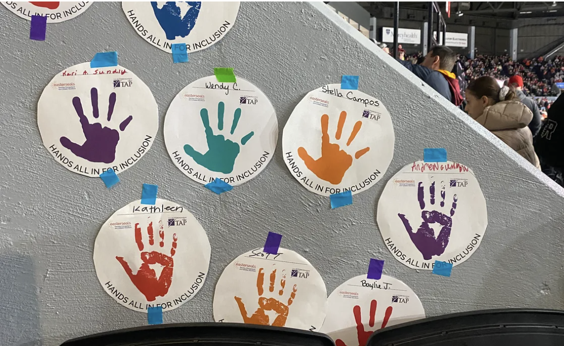 autism awareness night paper plates with painted hands