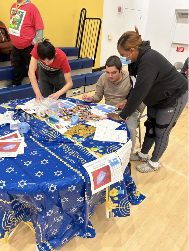 winter festival easterseals academy with hb threads pop up table