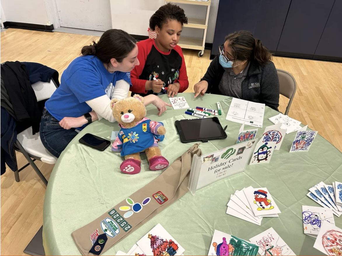 winter festival easterseals academy with hb threads pop up table
